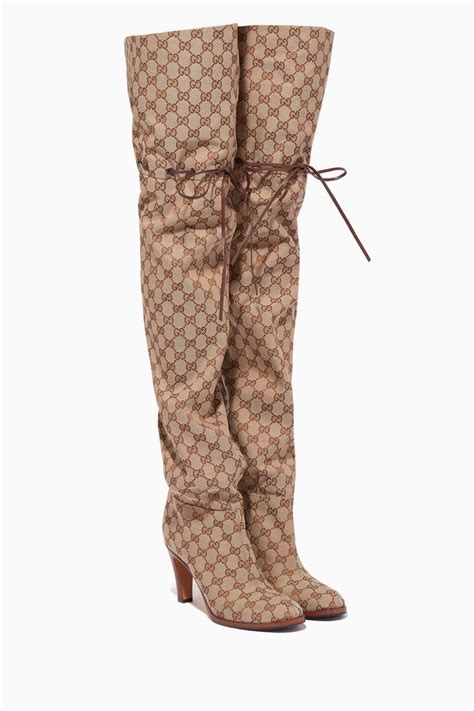 gucci cloth booties|Gucci print thigh high boots.